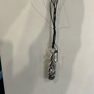 Super cute long necklace with snakeskin, print and silver placed on leather